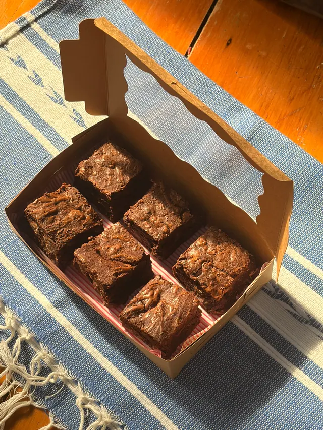 A boxed set of fudgy brownies.