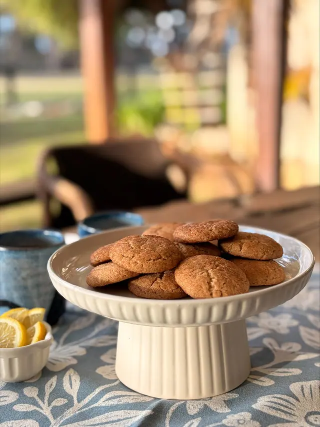 Bite-sized Cinnamon Hugs stacked on a cake stand.