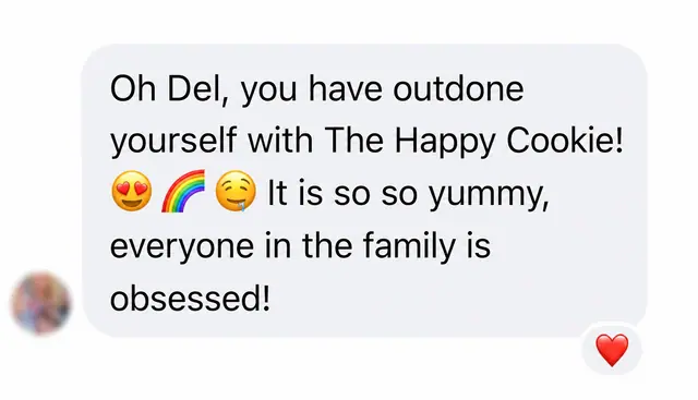 A customer review saying Del has outdone herself with Forever Favourite_Happy Cookie and the whole family is obsessed.